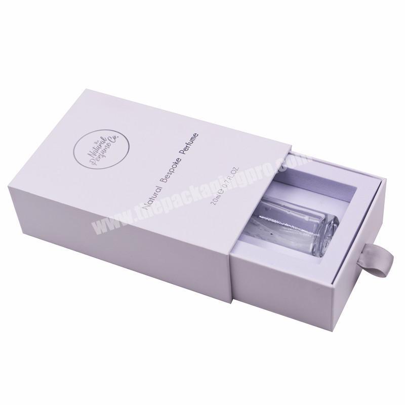 Custom emboss silver foil logo perfume luxury box sliding drawer gift box with white EVA insert for essential oil bottle