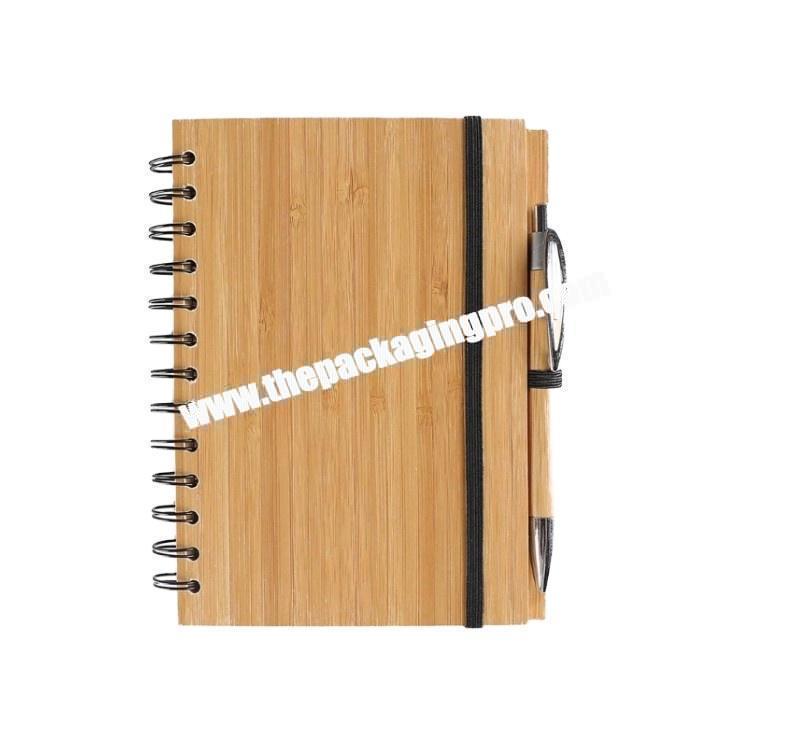 Custom Hot Sale Eco-friendy Gold Logo Wooden Bamboo Cover Spiral Ring Binding Notebook Wood Diary With Ball Pen Holder For Gift