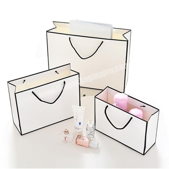 Custom kraft paper packaging bag garment gift paper bag with handles small black paper shopping bag