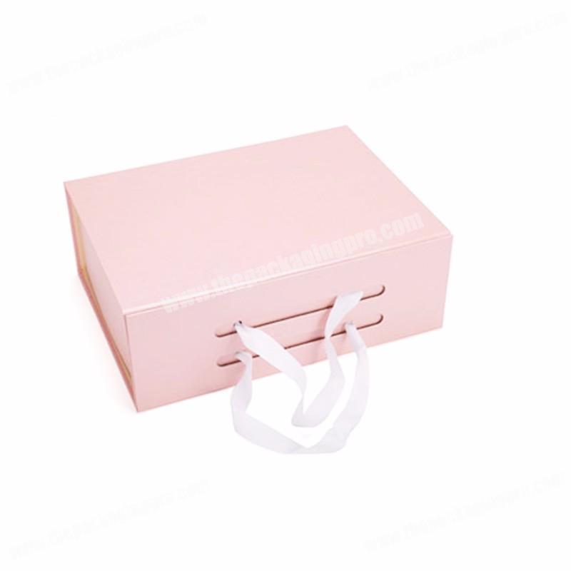 Custom luxury cardboard paper ribbon handle rigid clothing packaging box