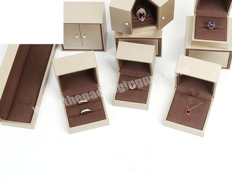 Custom luxury modern black rigid jewelry packaging box and pouch set