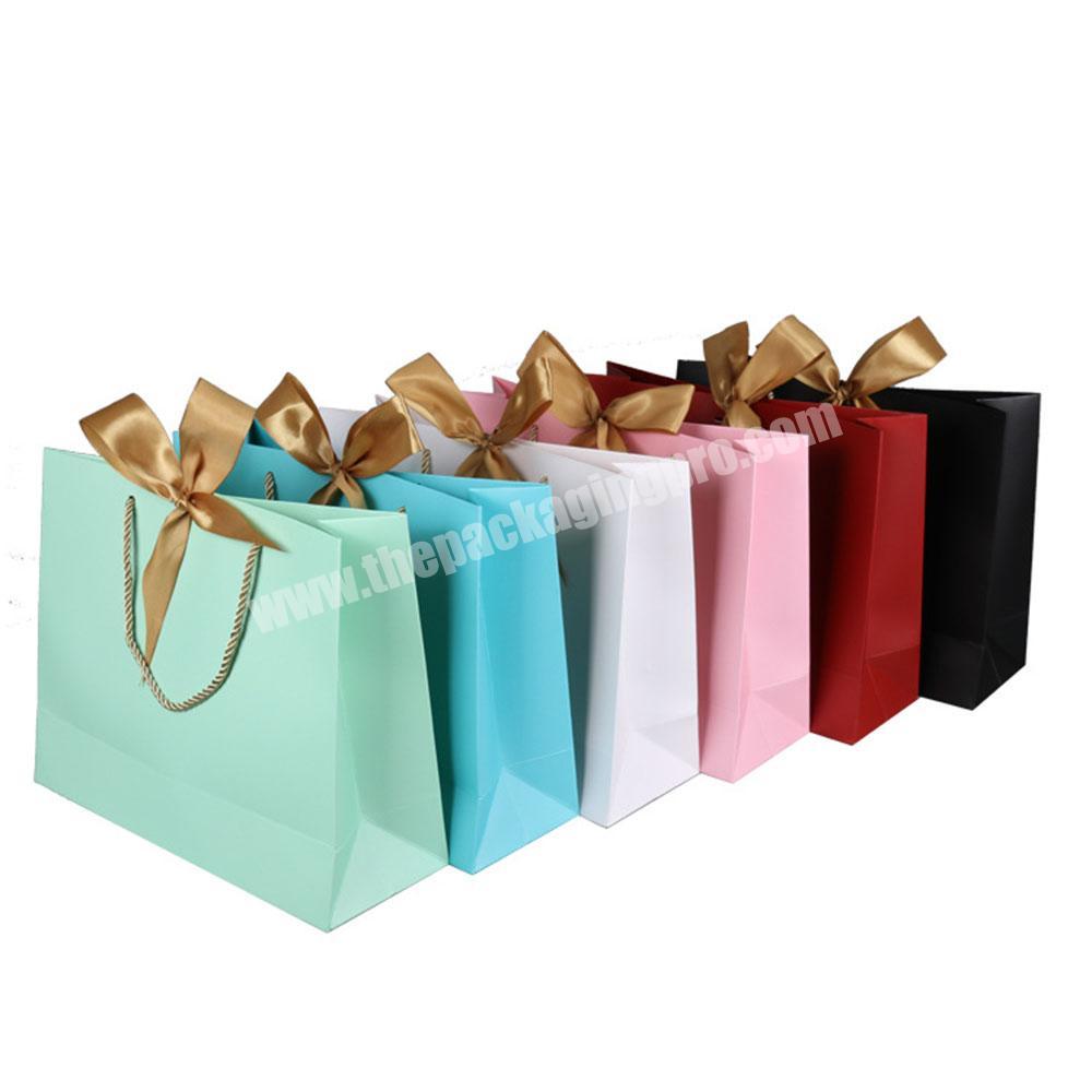 Custom luxury packaging gift colour paper gift bag with bow tie ribbon