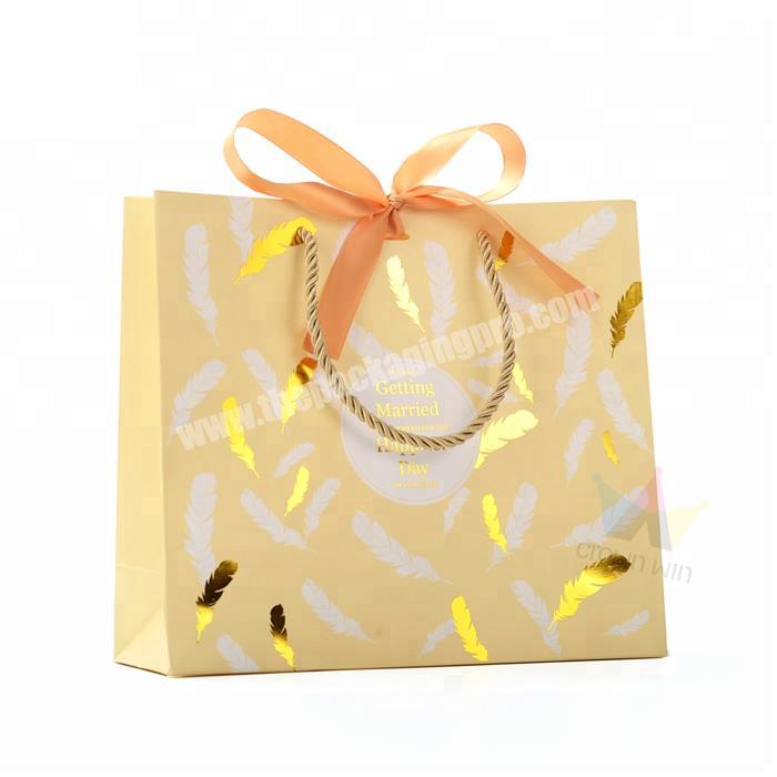 Custom Made Gold Foil Hotstamping Paper Bags With Golden Ribbon
