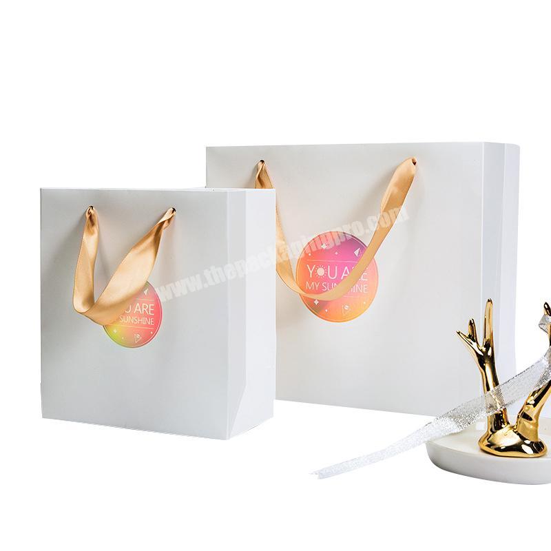 Custom made high quality logo gold foil stamping matt white bolsa de papel kraft for shopping and gifts