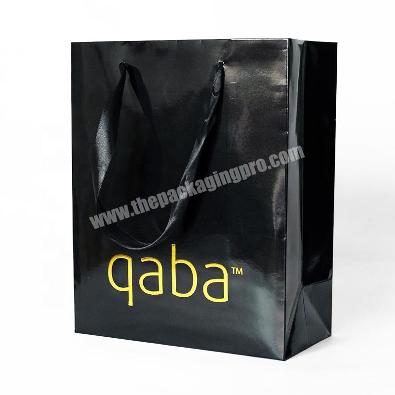custom paper bag with hot stamping gold logo and ribbon handle