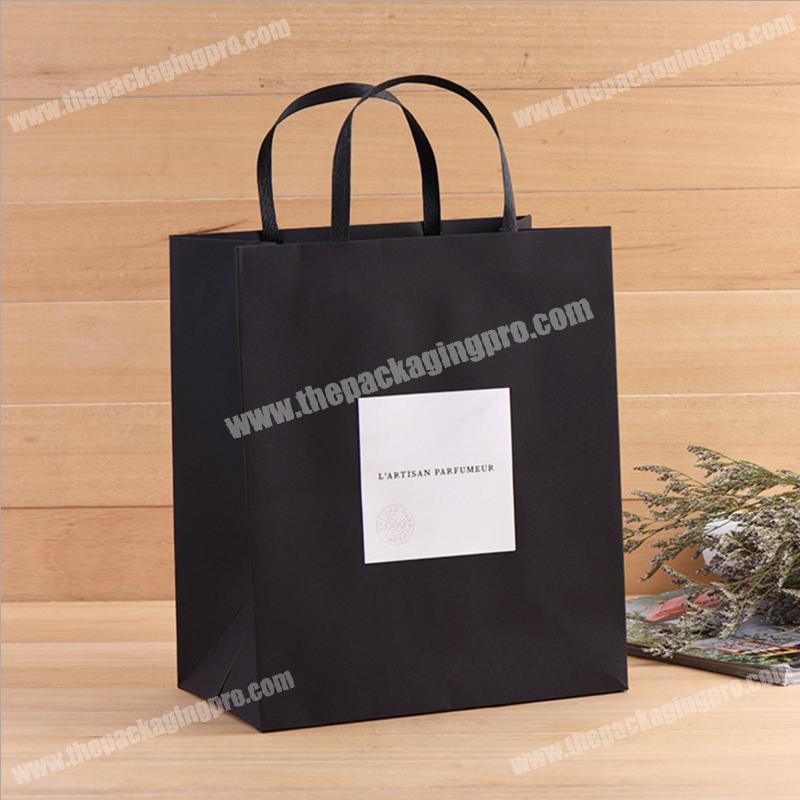 Custom printed handmade foldable garment shopping packaging paper bag with logo