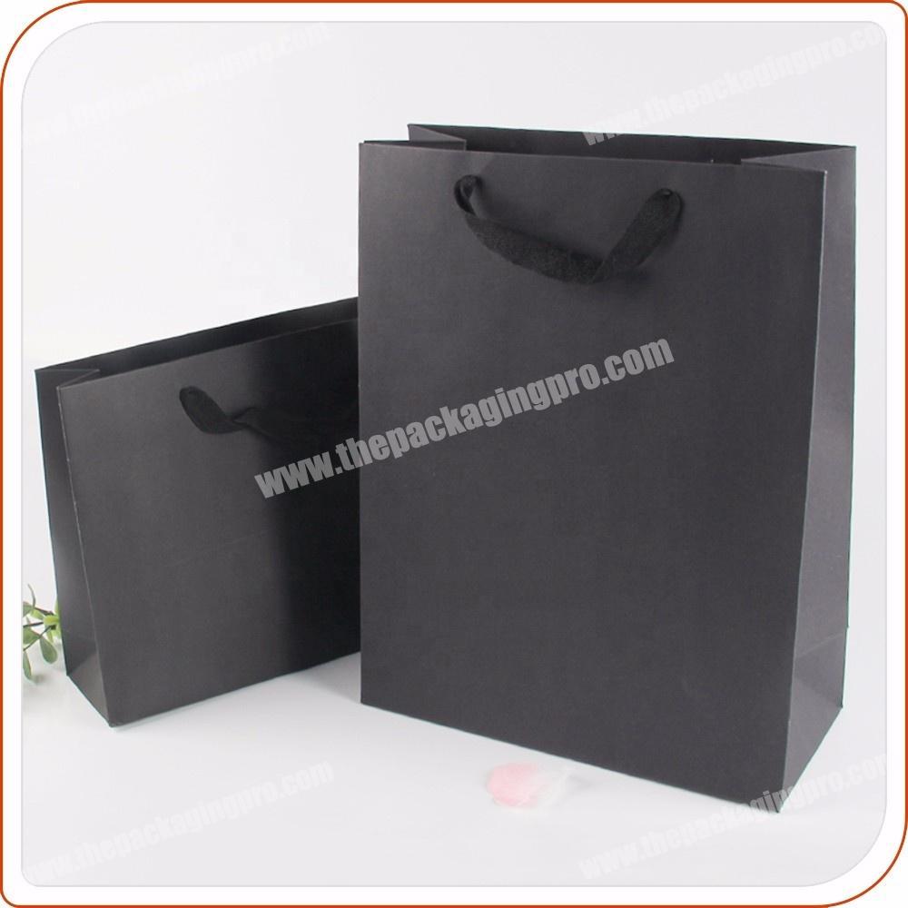 Custom printed matt black kraft paper gift bags for clothes packaging