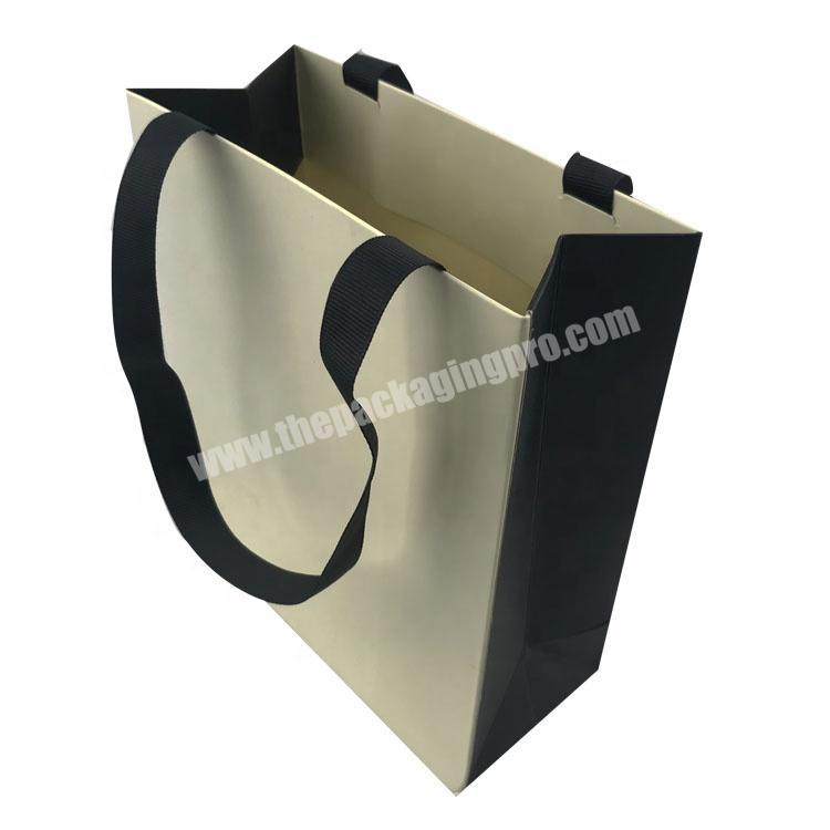 Custom printed matte surface  paper bag with black ribbon handle