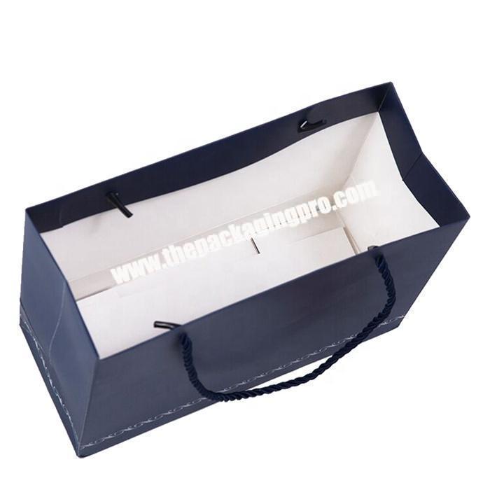 Customised paper shopping packaging bag with rope handle