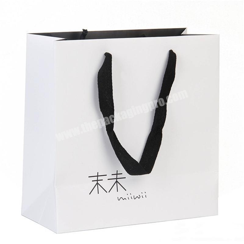 Customize luxury fancy  paper shopping bag with ribbon handle