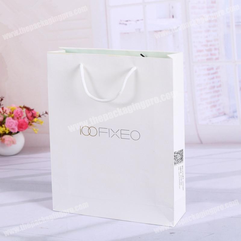 Customized China supplier new product clothes gift packaging paper bag