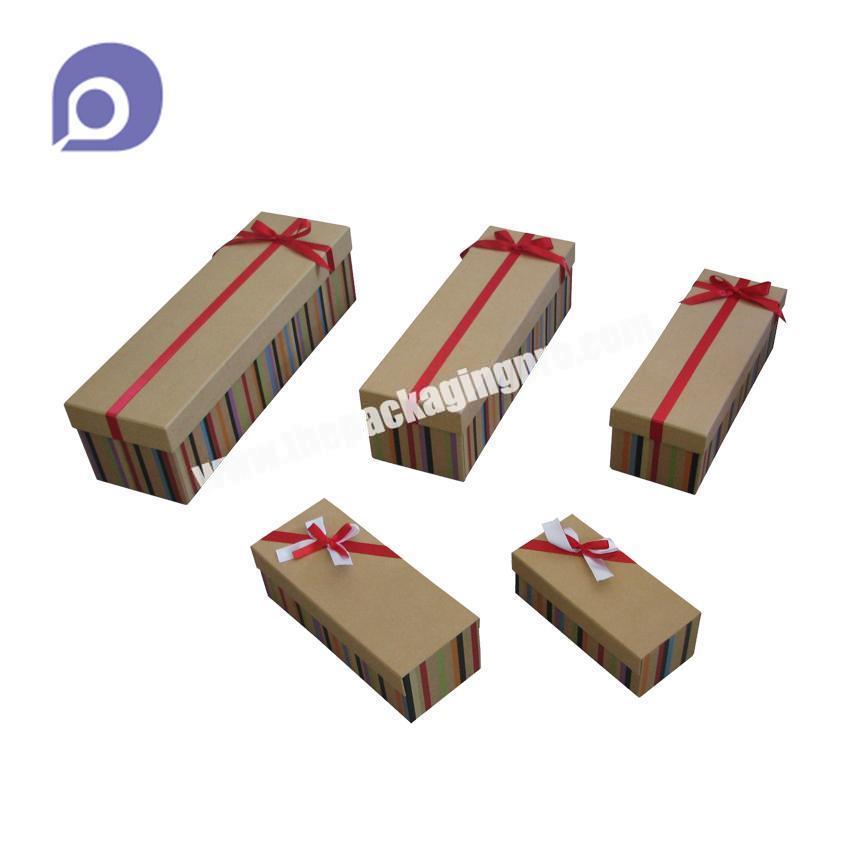 different size cardboard gift packaging box with red ribbons
