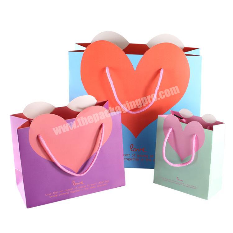 Elegant and luxury custom logo printing heart shape shopping paper bag with rope handle
