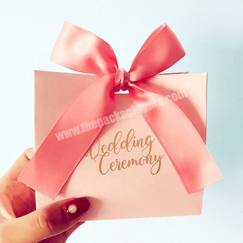 Elegant Luxury Gold Foil Stamping Logo Beauty Packaging Cosmetics Eyelashes Paper Bag With Ribbon Bow