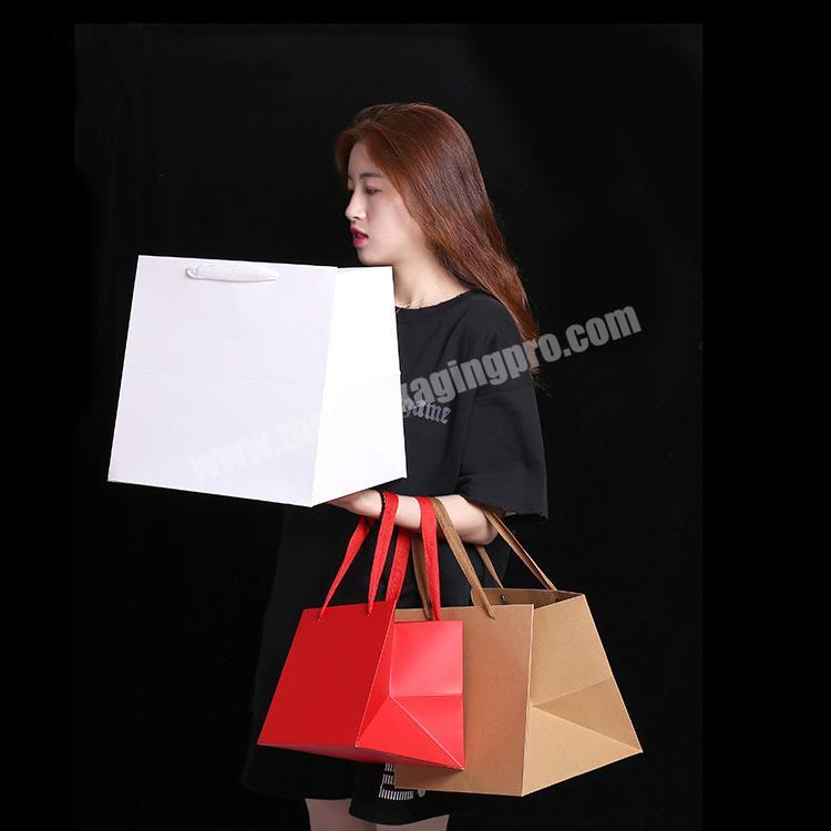 Environmentally friendly square bottom brown kraft paper shopping paper bag, customized wholesale with cake logo printing