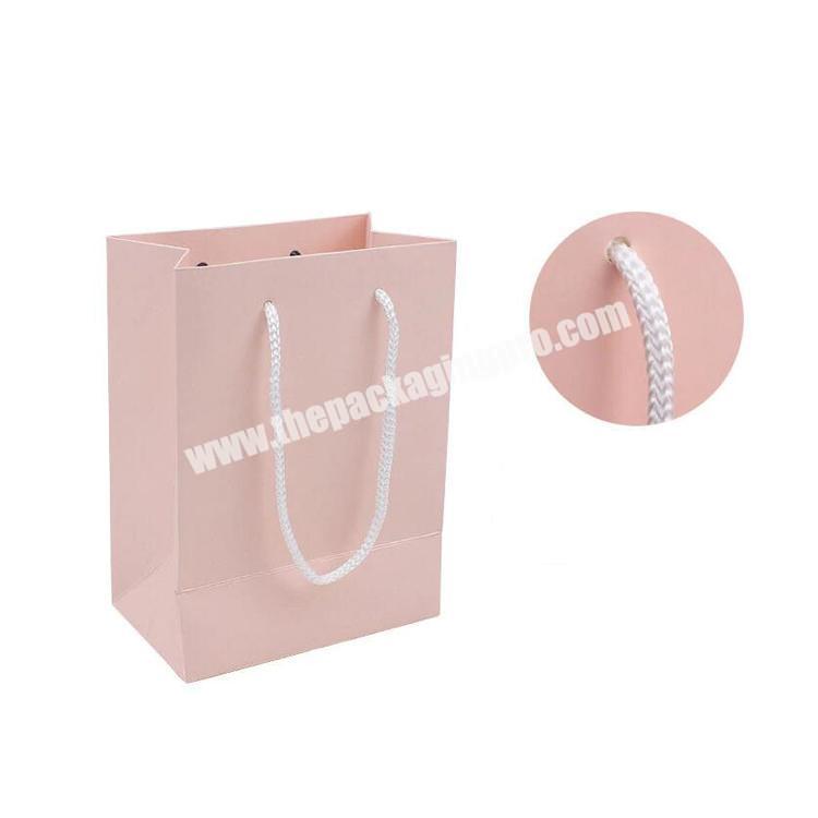 Factories Decorative cheap kraft paper bags eco paper bags folding luxury paper pouch with your own logo and ribbon
