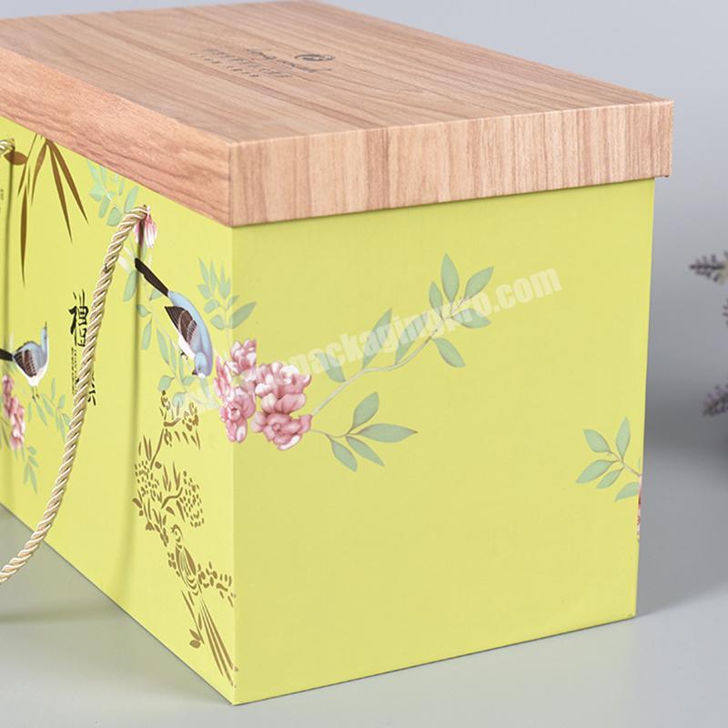 Factory Customized Wooden color printing paper packaging box with lid and handle convenient to take out paper packaging