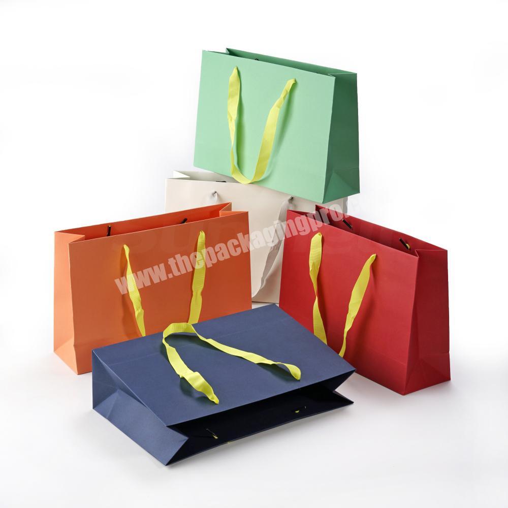 factory price customized high quality uncoated 100% recycle dyed color paper bag packaging with ribbon handle