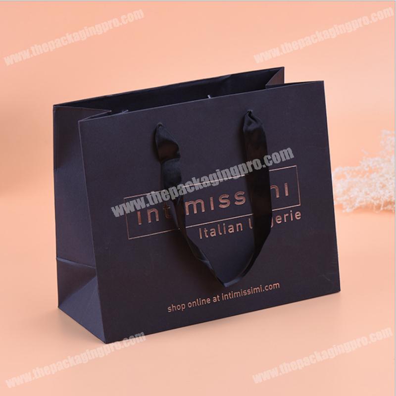 Famous brand clothing packaging black art paper bag fancy eco paper gift bags with hot stamping