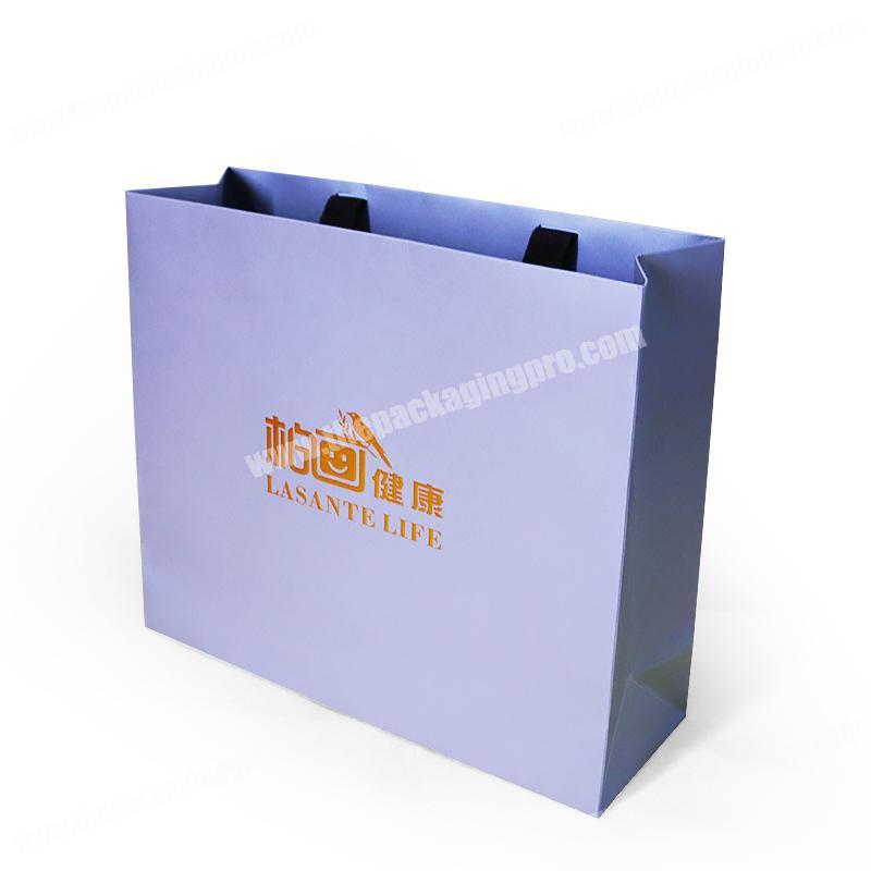 Fancy printed paper bag with your own logo custom paper bag with different handles fashion paper packaging bag