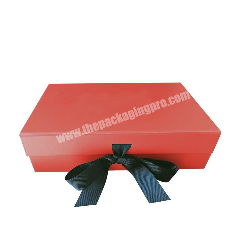 Foldable magnetic gift box with ribbon closure