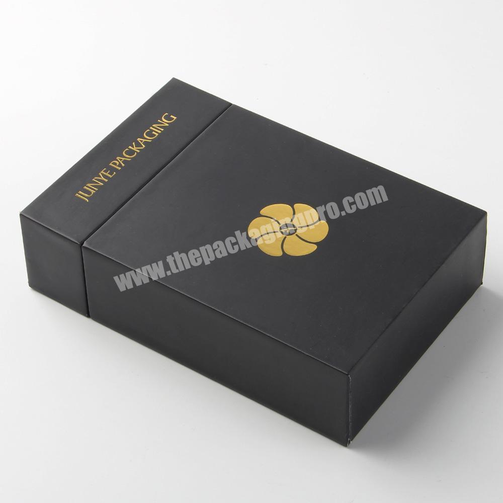gold foil custom textured black paperboard box with drawer