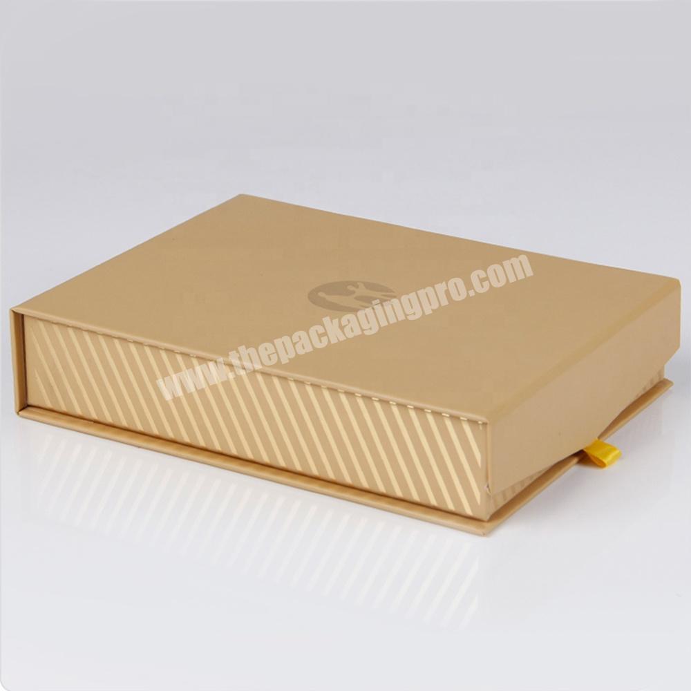 gold jewelry box packaging with custom printed ribbon