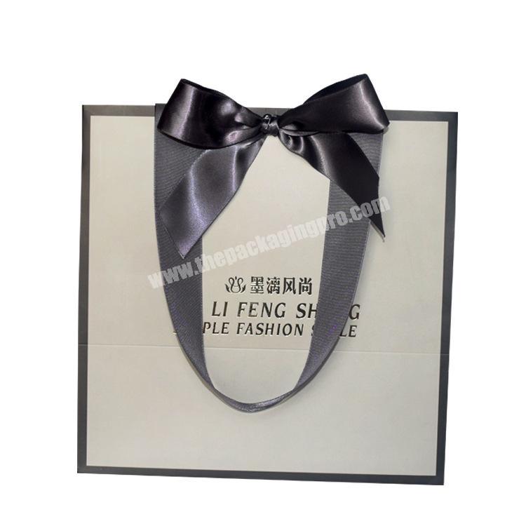Guangzhou Custom wholesale paper bag printing logo shopping gift bag for jewelry packaging
