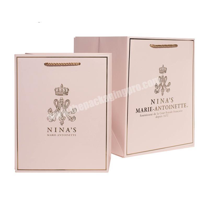 High Quality Cheapest Price Small Size PP Twisted Handle With Tie A Knot Pink Color Packaging Paper Bags