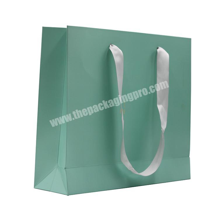 hot selling new design flat handle shopping paper bag for cosmetics