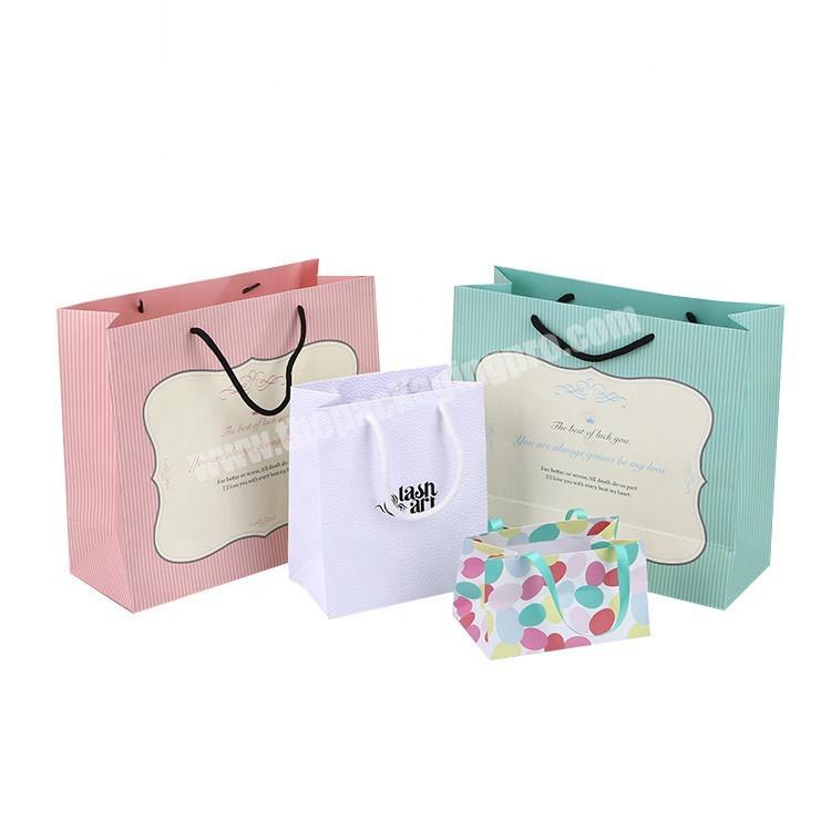 Hot Stamping Foldable Kraft Paper Packaging Retail Clothing Shopping Paper Bag With Rope Handle