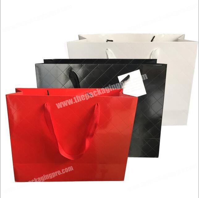 laminated film coated high quality top grade embossed paper bag for packing clothes and gift garment bag