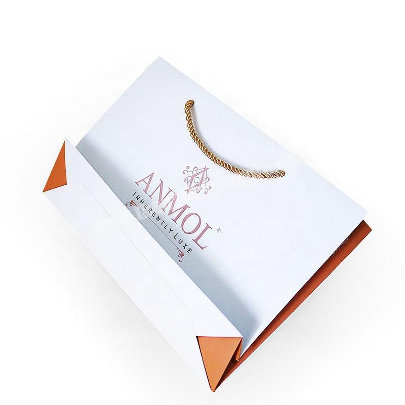 Logo printed gloss handle inherently luxe luxury white paper bag