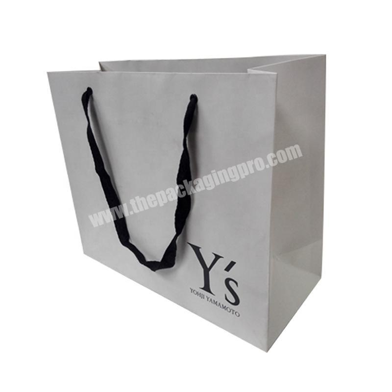 Low moq paper shopping bag custom for clothes packaging