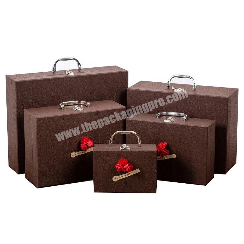 Luxury cardboard travel case paper small suitcase box with handle
