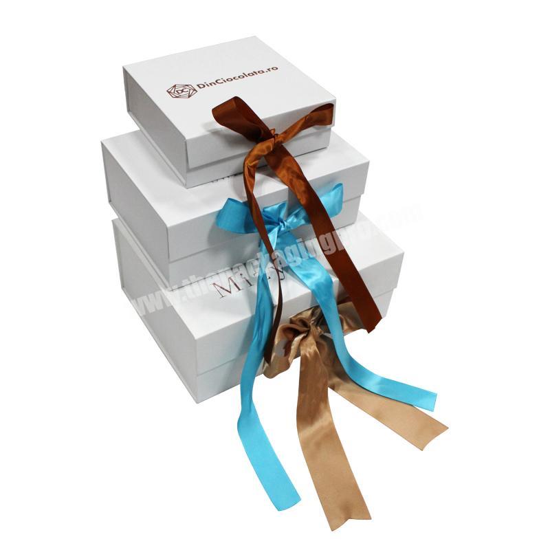 Luxury Custom Printing White Cardboard Rigid Magnetic Gift Set Flat Pack Folding Paper Packaging Box With Ribbon Closure