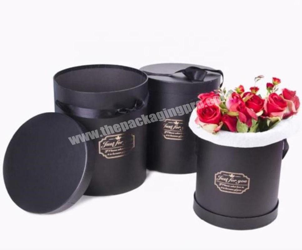 Black Round Floral Hat Box with Gold Accent