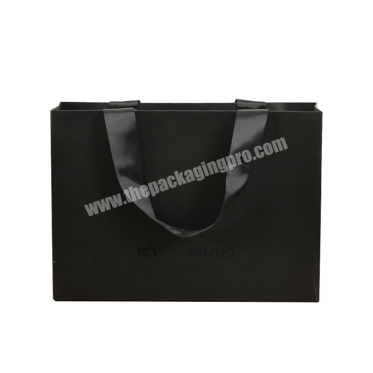 Luxury Matte Black Gift Paper Bag Custom Made Printed Logo Jewelry Packaging Kraft Shopping Paper Bag With Ribbon Handles