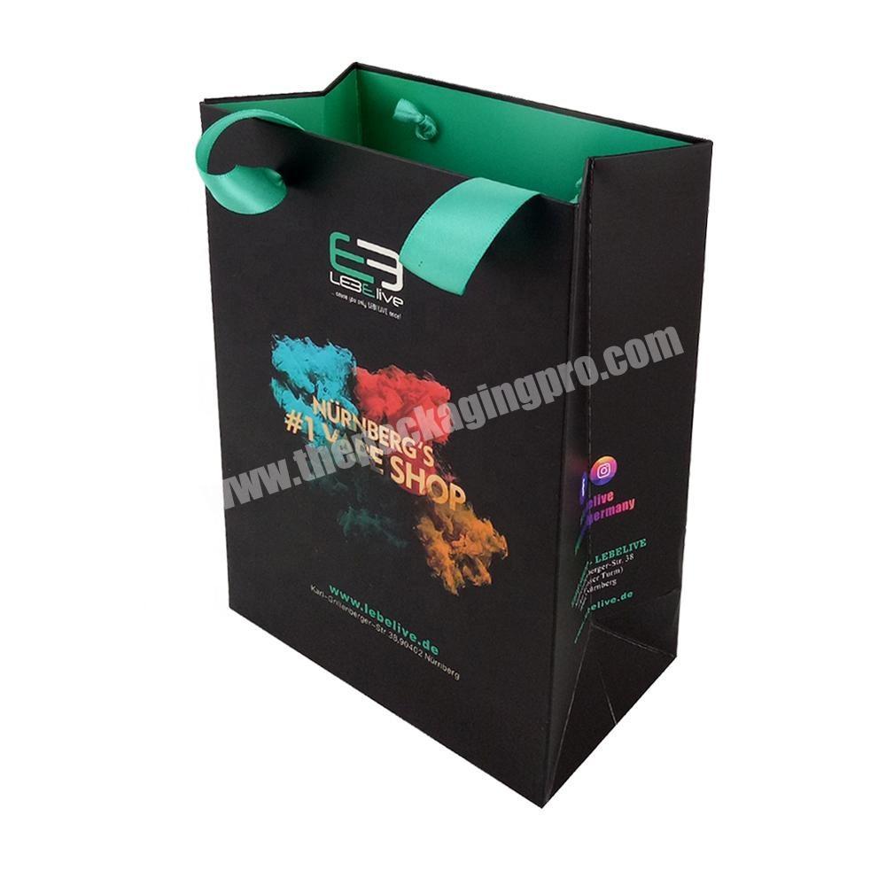 Luxury paper shopping bag with ribbon handle for shopping mall