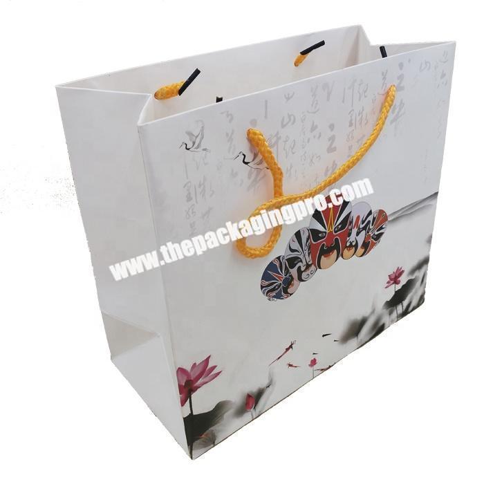 Luxury slogan printed cardboard packaging paper bag