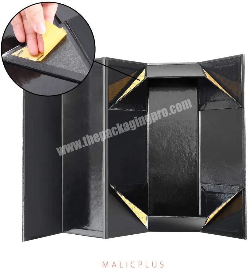 Magnetic closure collapsible gift boxes glossy black embossing wine bottle gift boxes for liquor and champagne