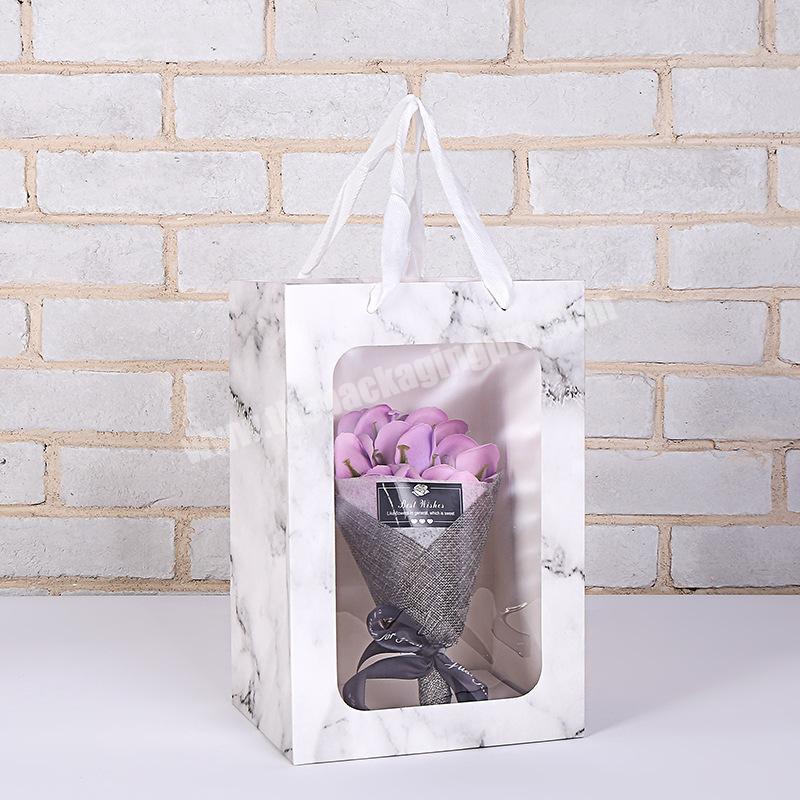 New style white marble window transparent gift bags with ribbon handles