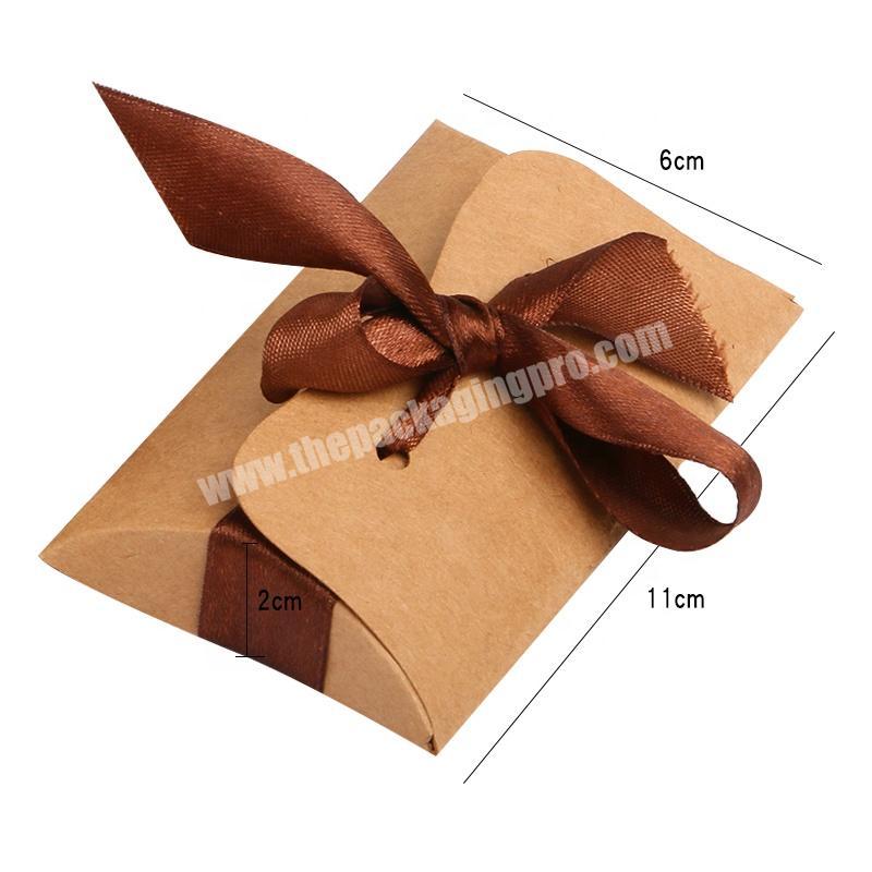 no moq low cost cheap price custom print eco friendly brown kraft paper pillow box with ribbon for candy for candle
