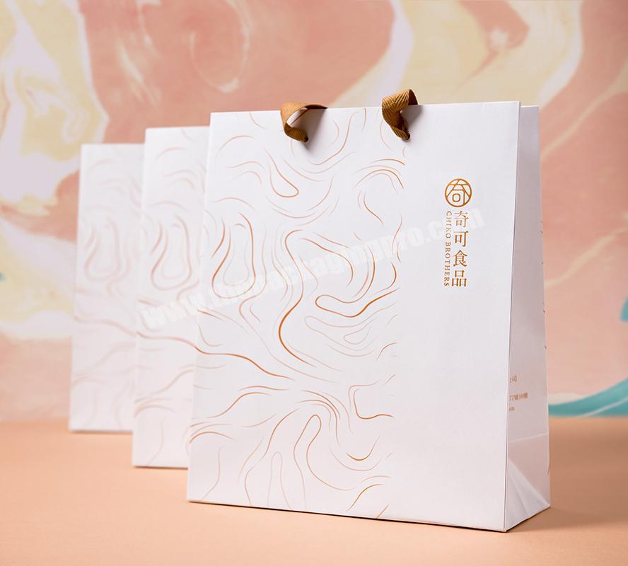 OEM custom free design Luxury paper package bag packaging bags paper bag carrier bag