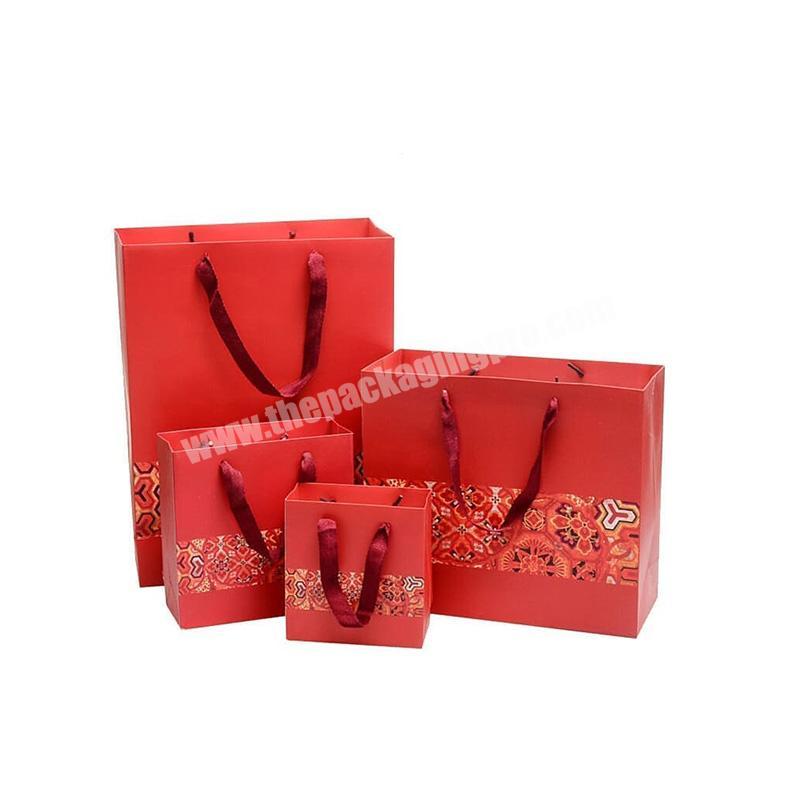 OEM Custom red shopping custom luxury paper bags with your own logo