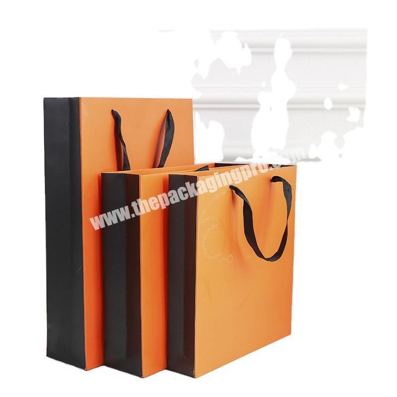 OEM Factory Orange color printing gift box and paper bag together with flat handles