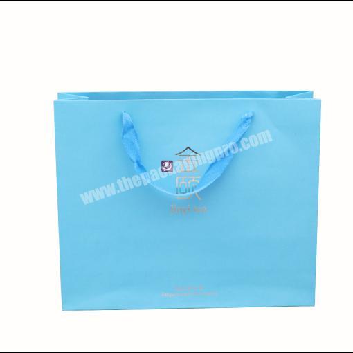 OEM Factory Wholesale Christmas paper gift bag blue gift paper bag simple design shopping handle paper carrier bags