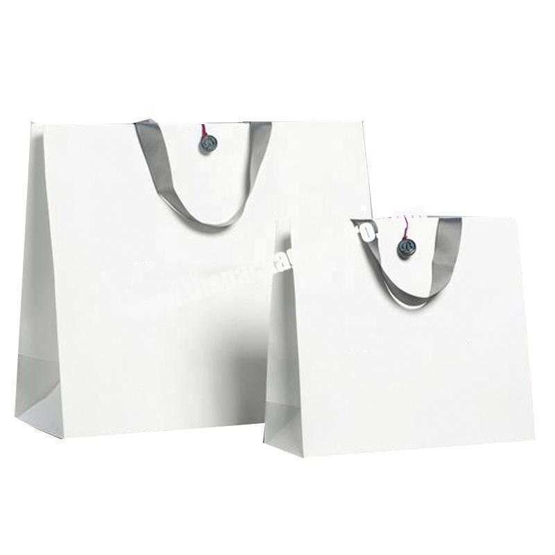 Paper bag for ladies fashion shoesRecycle paper bag with ribbon handle
