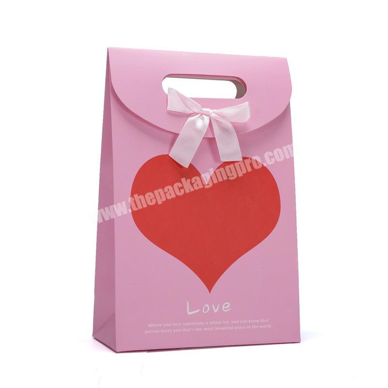 Pink printing gift paper bag with ribbon handle
