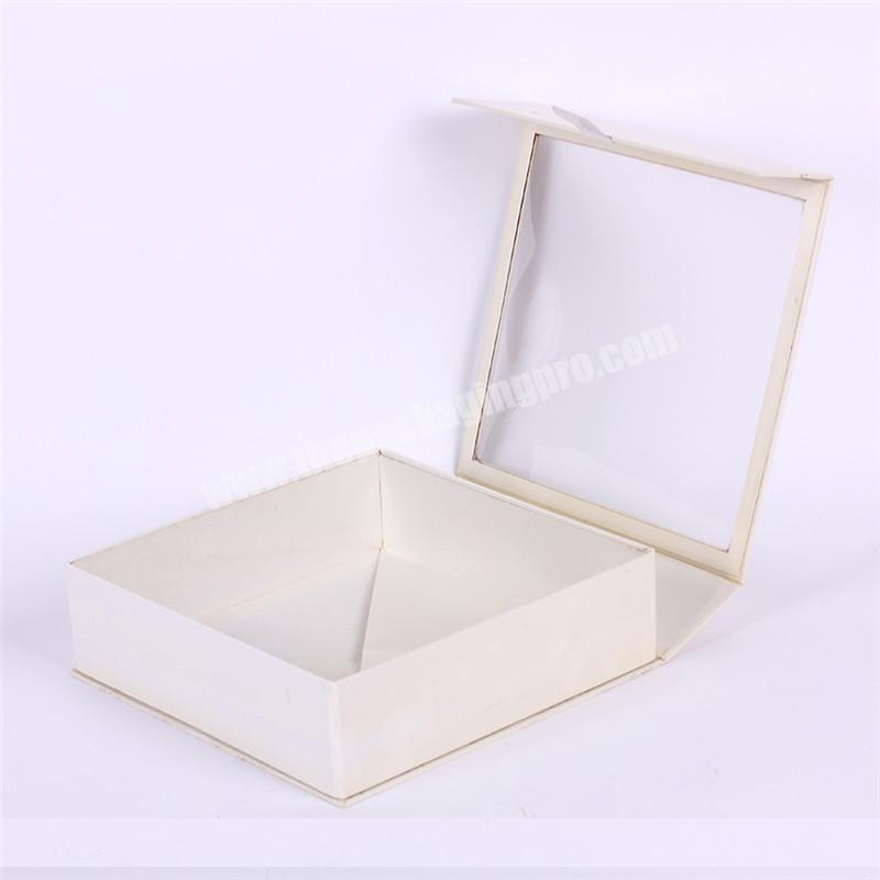 Plain white folded paper boxes with window